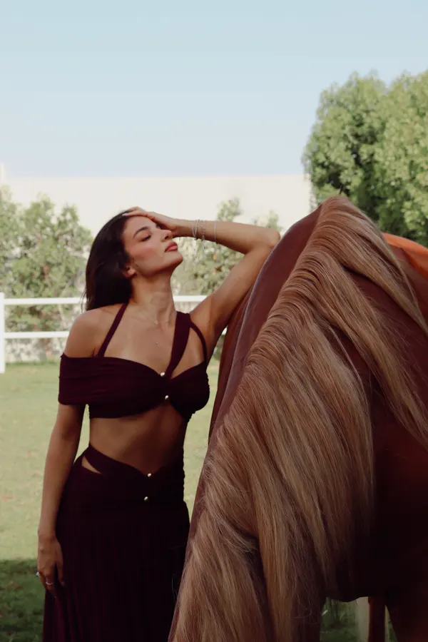 Vertical fashion shoot with horse Dubai