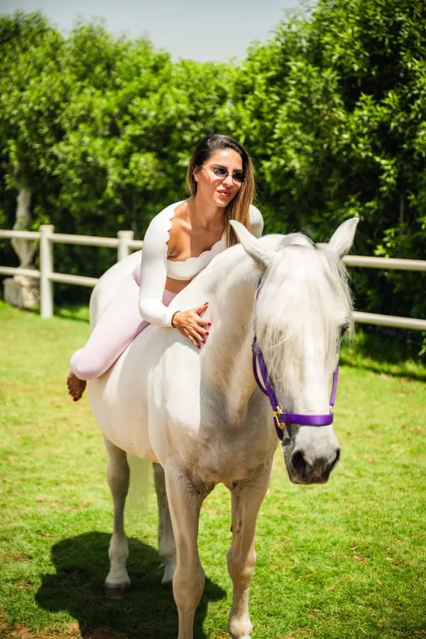 Ground-based pilates in the calm presence of horses at Crystalline Equine Dubai